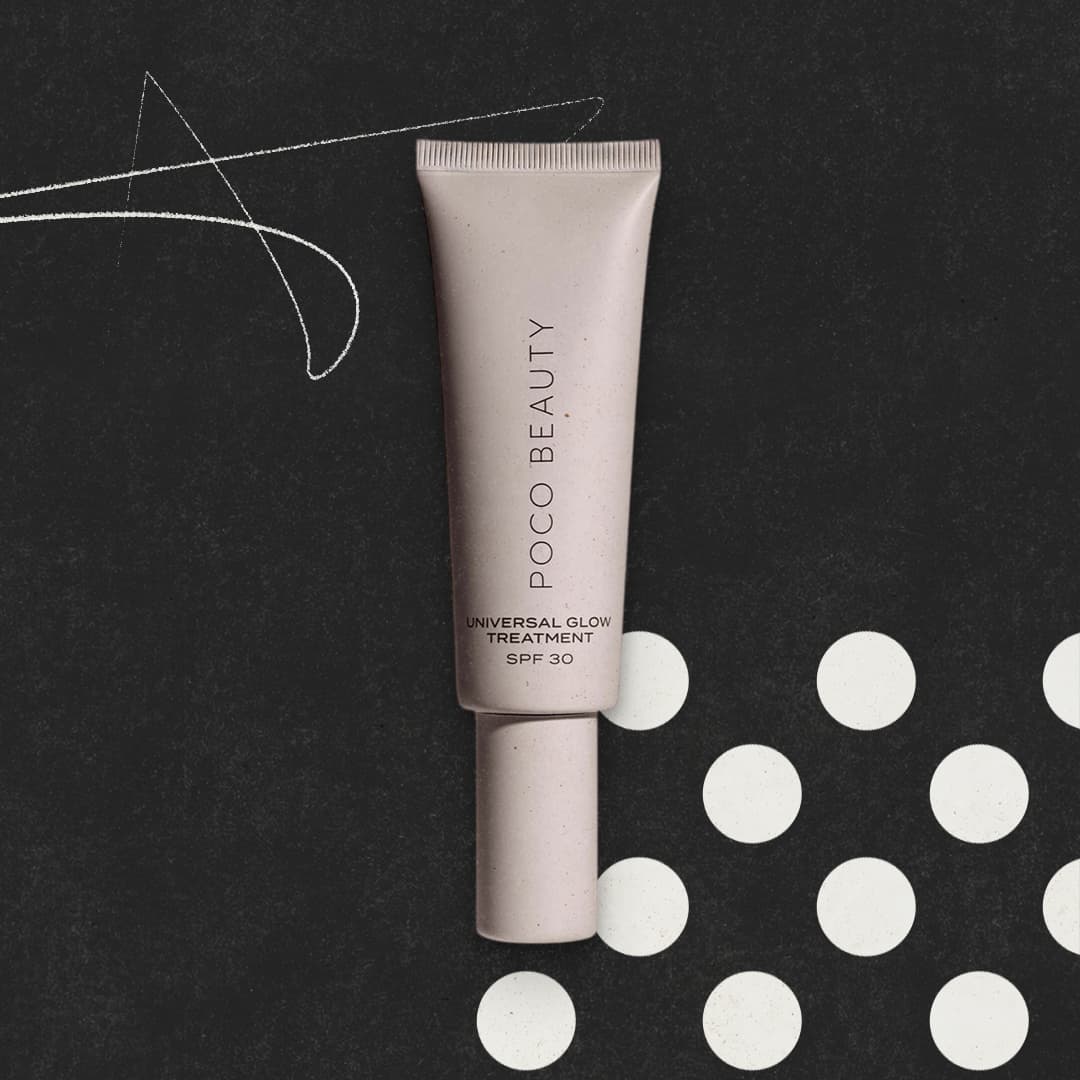 A tube of Poco Beauty Universal Glow Treatment SPF 30 is placed on a textured black background with white dots and a decorative line.