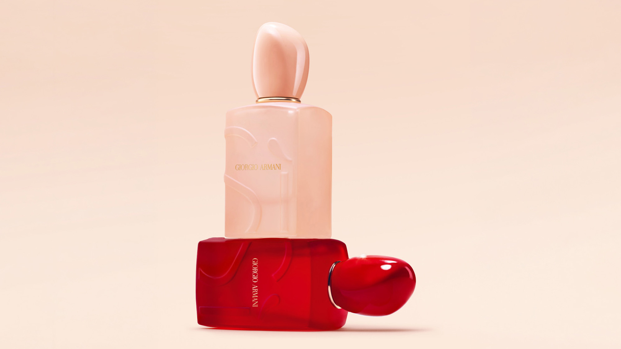 Giorgio Armani Sì Nude Bloom fragrance bottle in blush pink with red velvet case