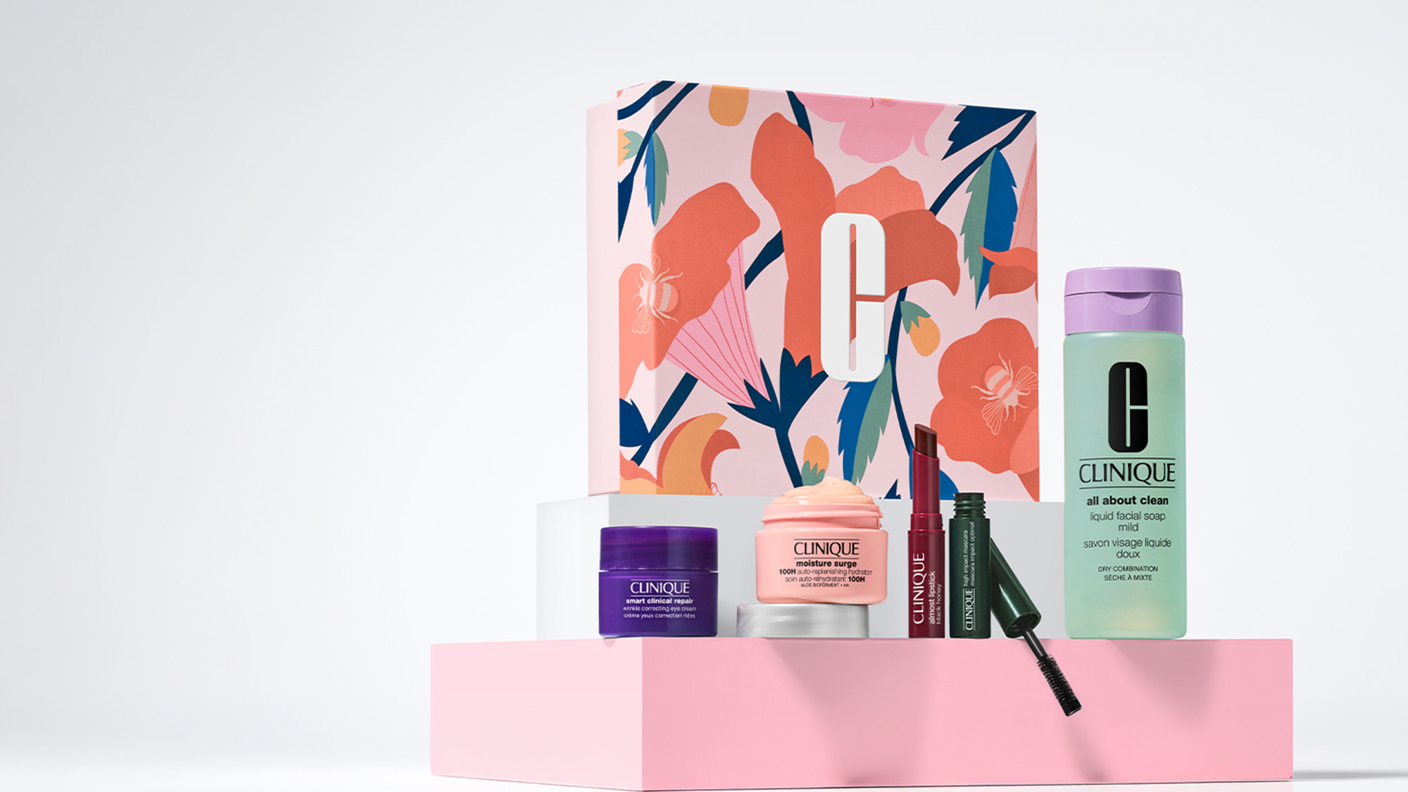 Clinique gift with purchase set including skincare, moisturiser, mascara and facial soap in decorative floral box