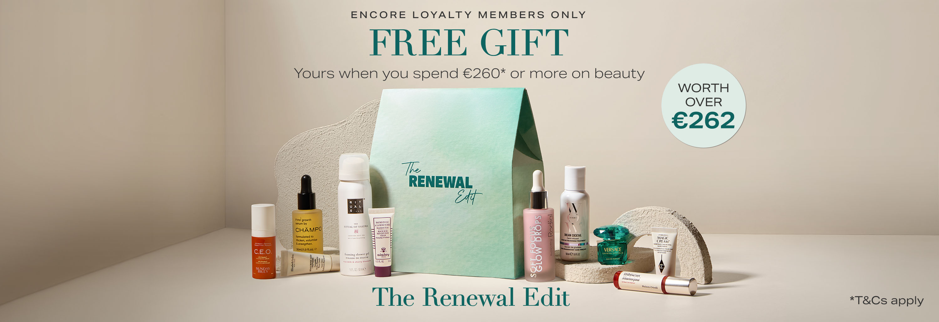 Beauty products and a green bag labeled 'The Renewal Edit' are displayed as a free gift offer valued at over €262 with a purchase of €260+. Encore Loyalty Members Only.