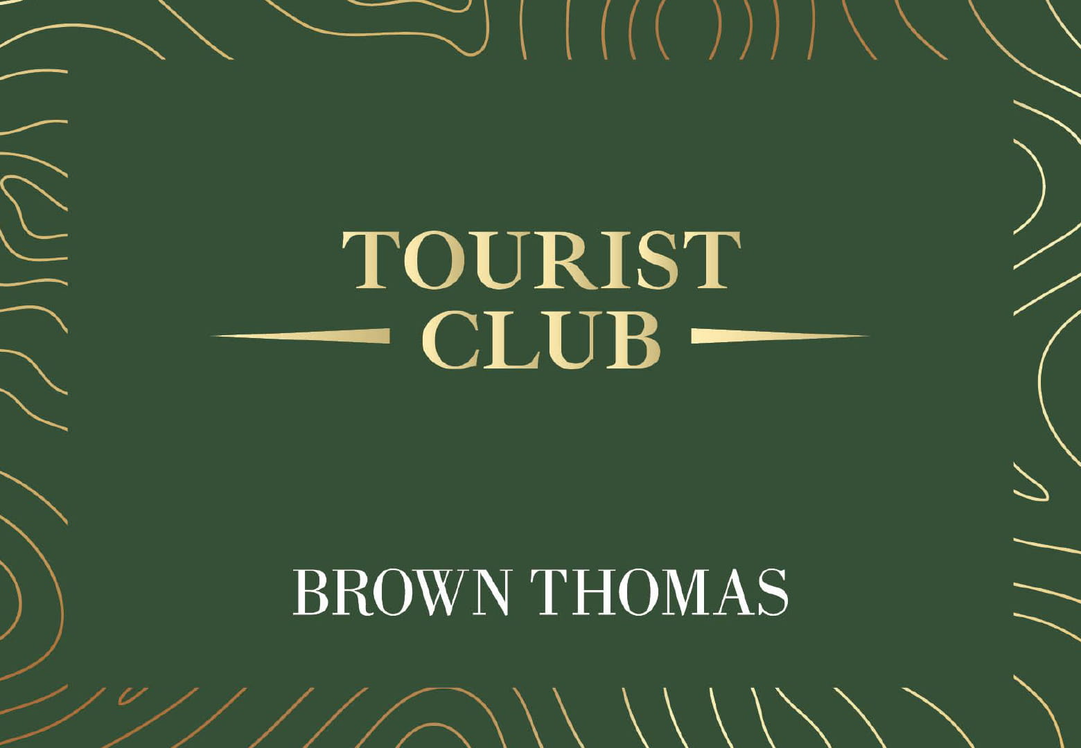 Green background with 'TOURIST CLUB' and 'BROWN THOMAS' in gold and white text, surrounded by decorative gold lines.