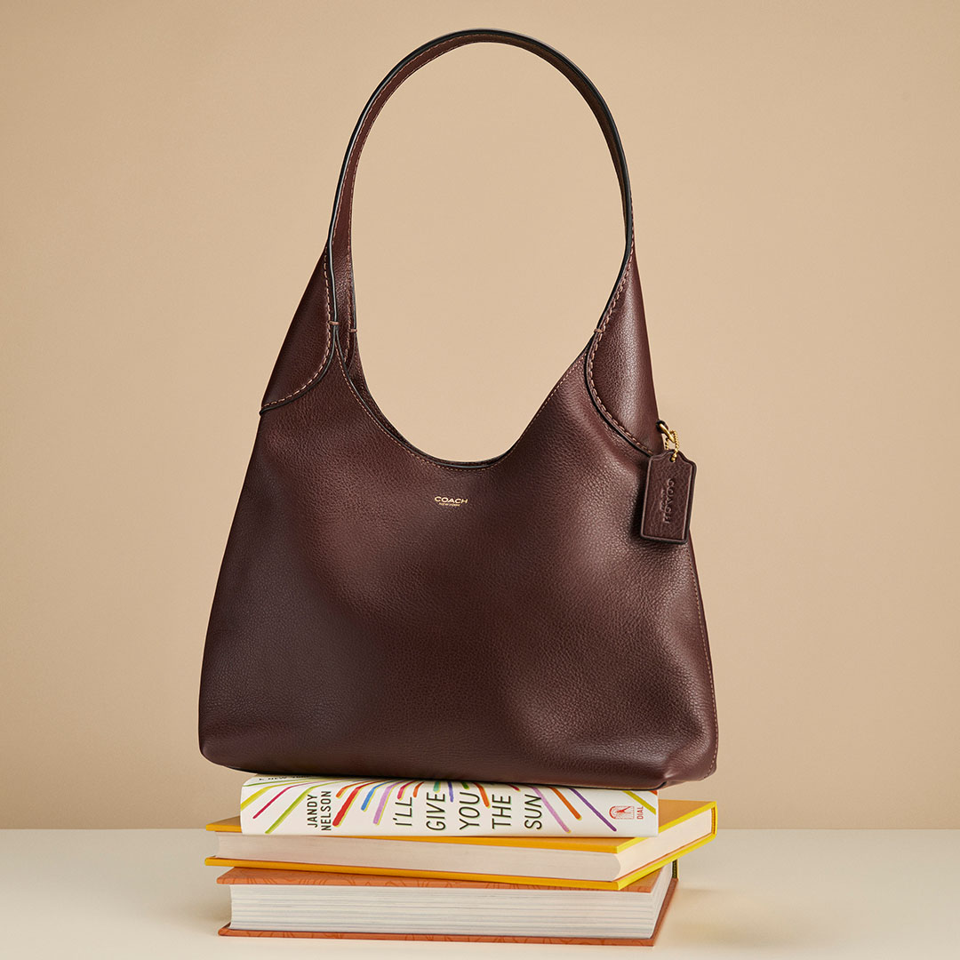 Coach leather bags including the Brooklyn and Tabby styles displayed in a curated collection