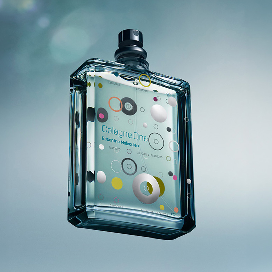 Escentric Molecules Cologne One fragrance bottle with colourful molecular design elements against soft blue background
