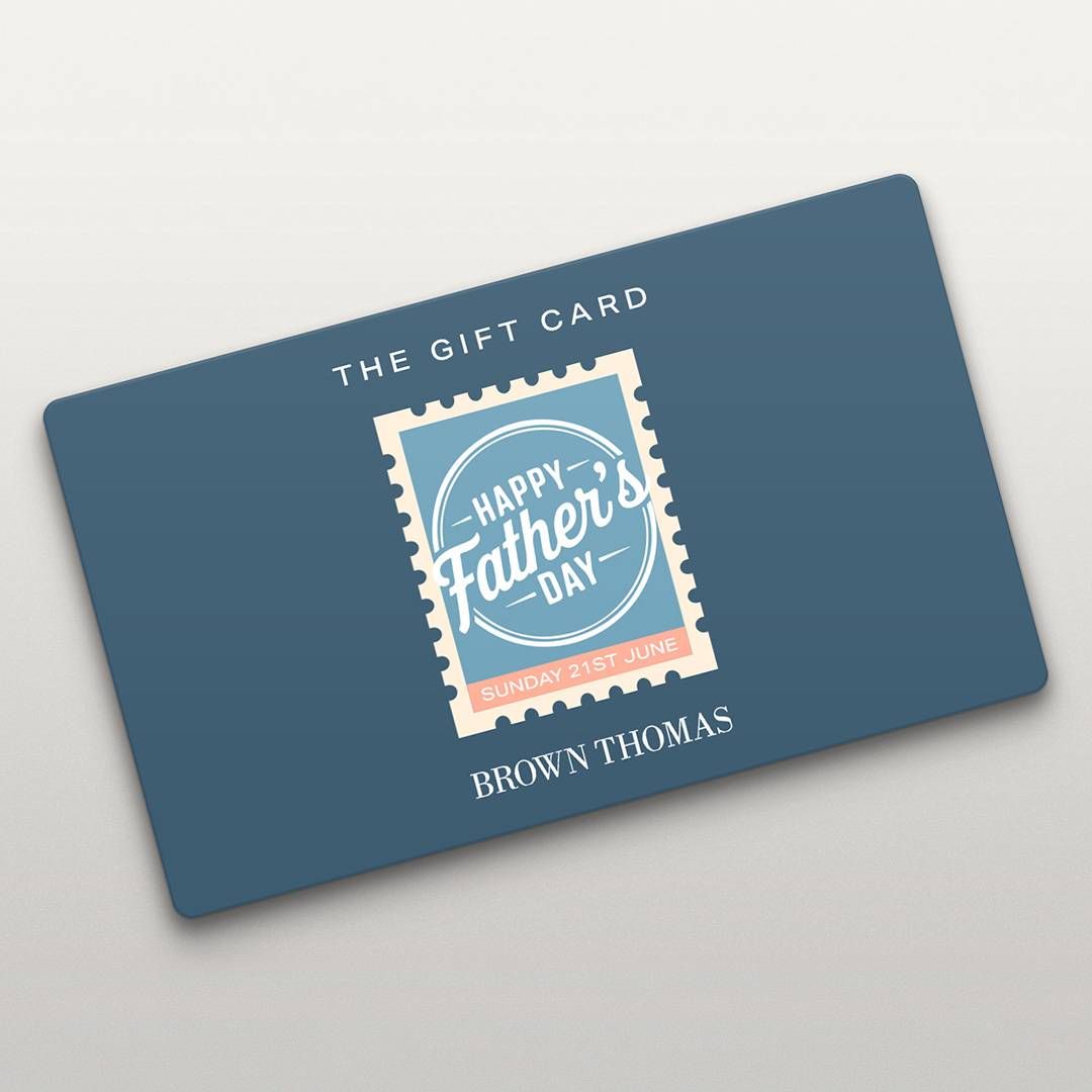 Blue gift card with Happy Father's Day stamp design and Sunday 21st June date. Brown Thomas branding.