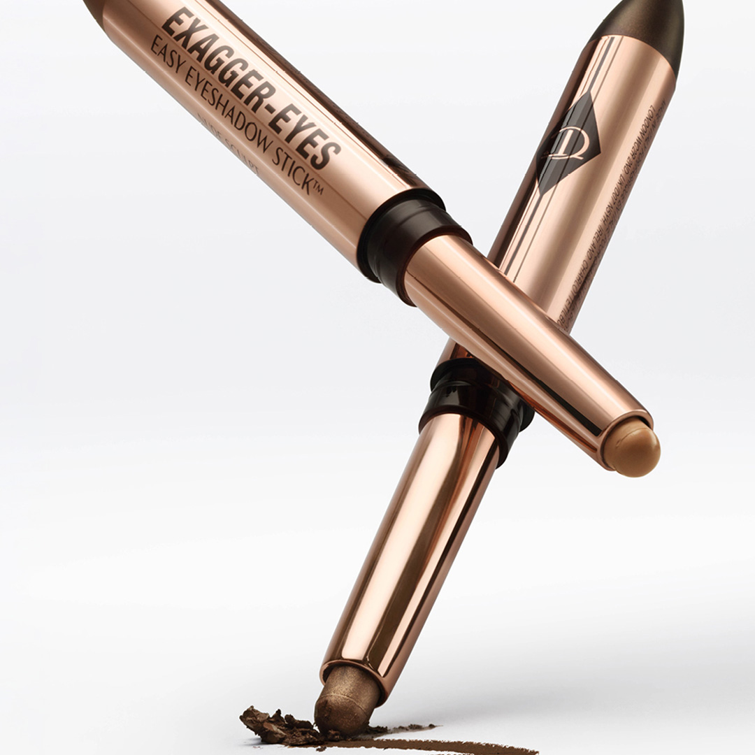 Charlotte Tilbury Exagger-Eyes Easy Eyeshadow Sticks in bronze and black with swatched eyeshadow pigment