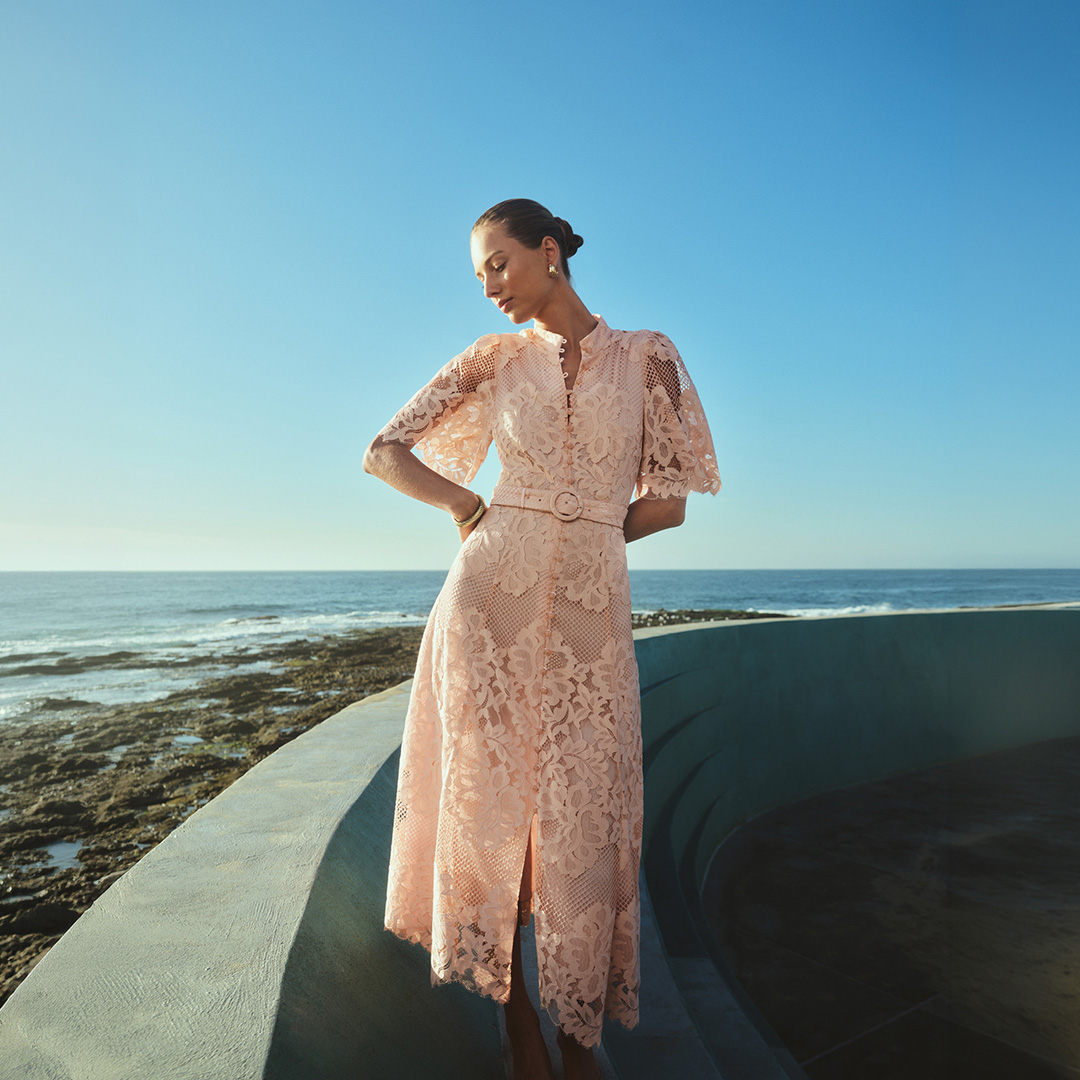 Women's holiday shop featuring summer wardrobe pieces for travel and seasonal occasions