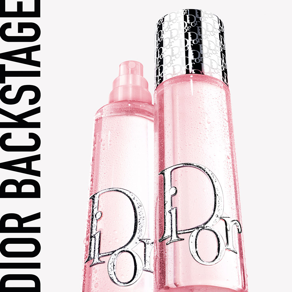 Two pink Dior backstage spray bottles with black and white branding.