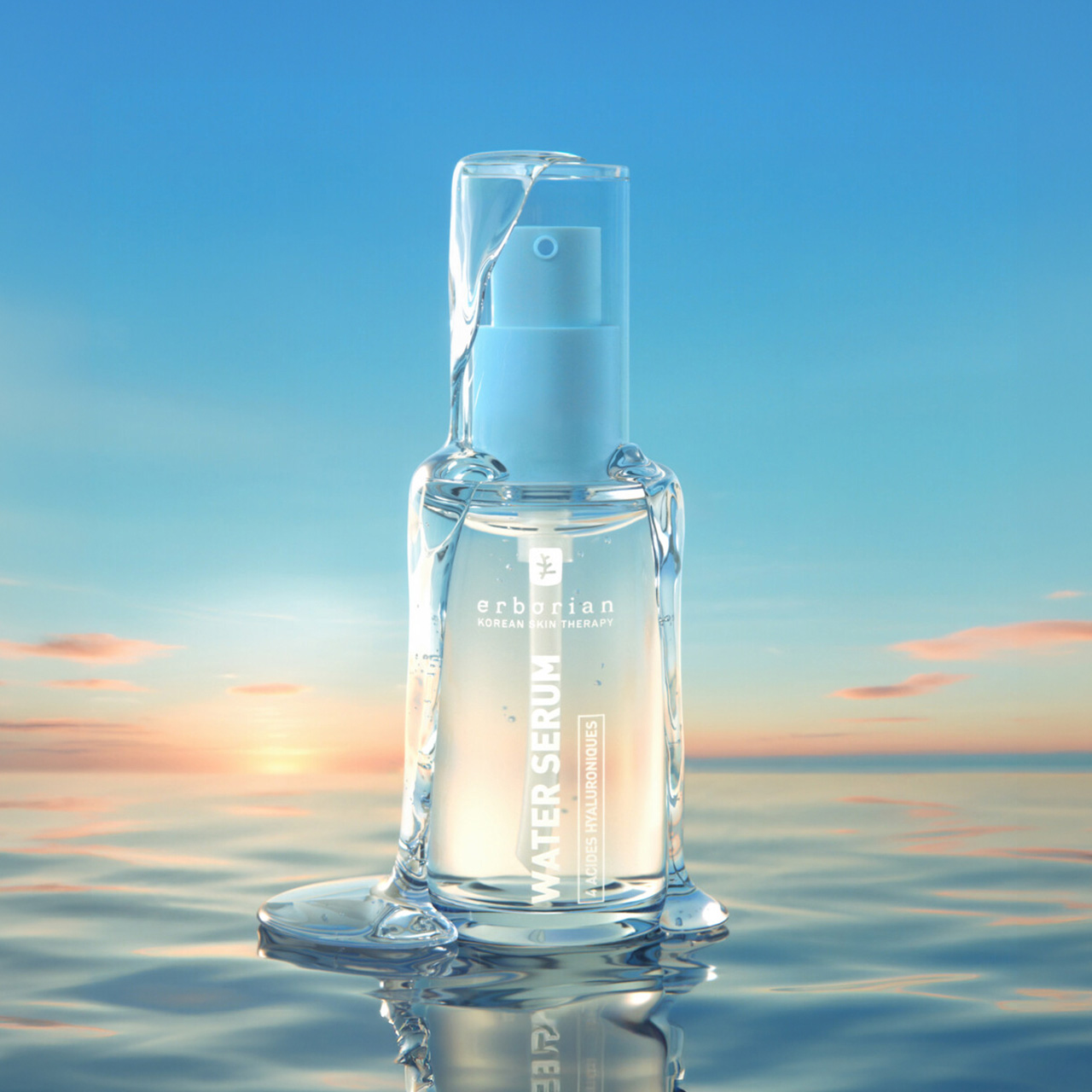 Erborian water serum bottle on serene seascape with sunset sky backdrop