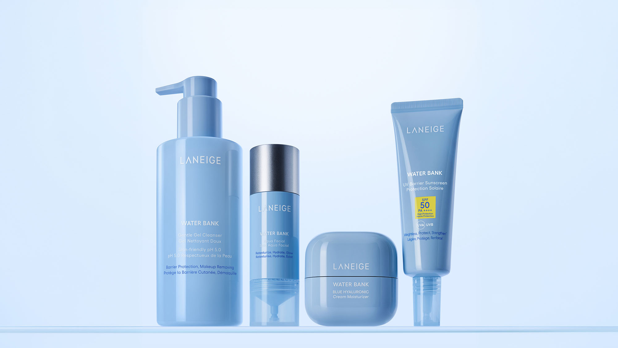 Laneige Water Bank skincare collection featuring cleanser, essence, cream moisturiser, and sunscreen products in blue bottles and jars