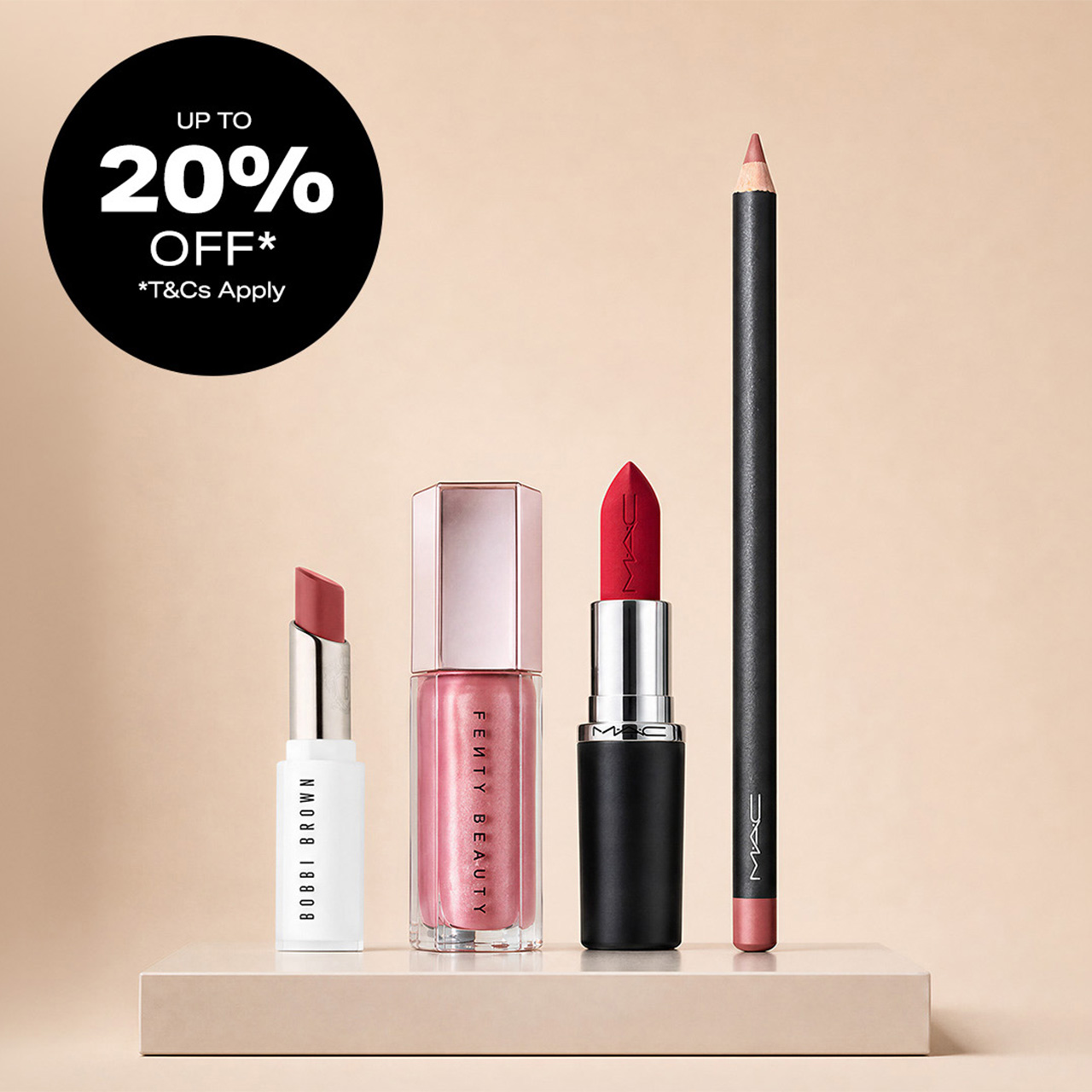 Makeup products on display: lipsticks, gloss, pencil. Black circle with 'Up to 20% off* T&Cs Apply' text.