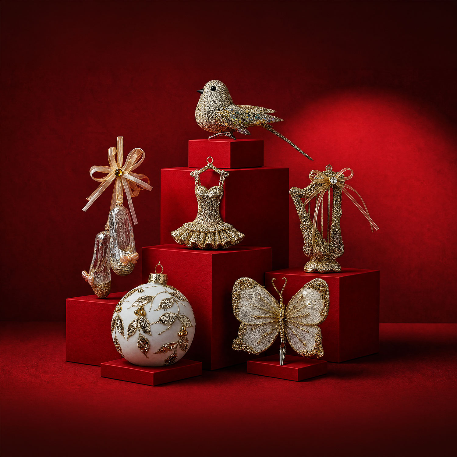 Golden mistletoe theme with shimmering gold ornaments and decorations: gold bird, ballet dress, candelabra, butterfly, holly sprigs and white pearl bauble