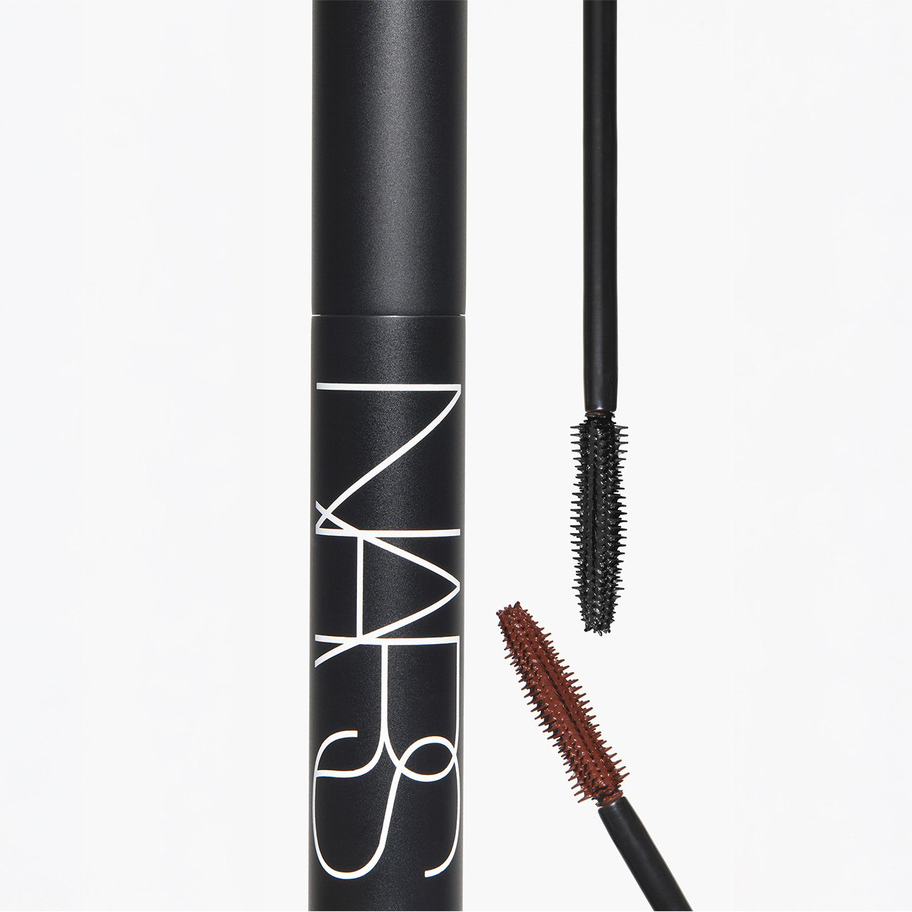 NARS Notorious Mascara with black and burgundy brush applicators displayed against white background