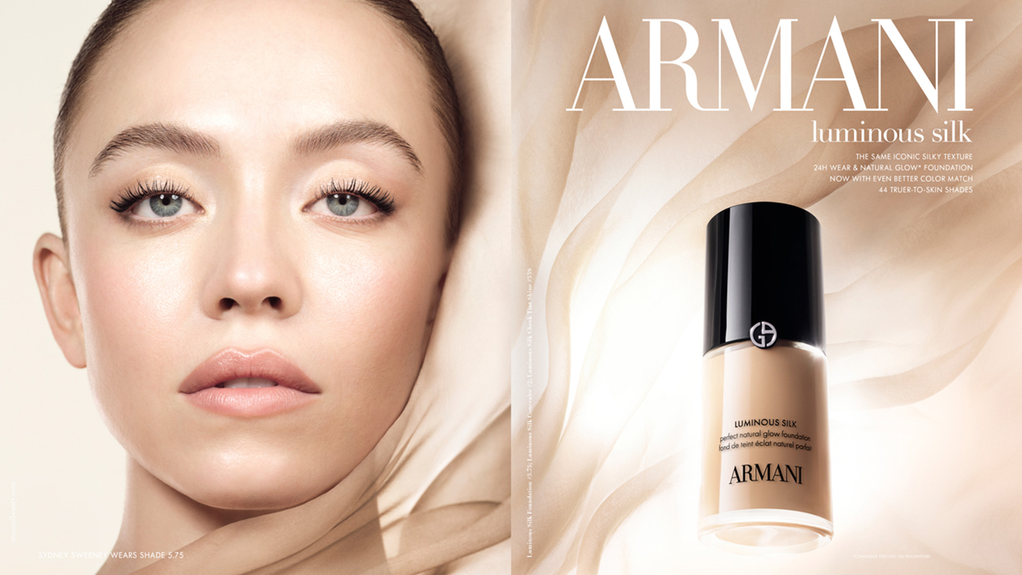 A close-up of a person next to a bottle of Armani Luminous Silk foundation, with soft, flowing fabric in the background.