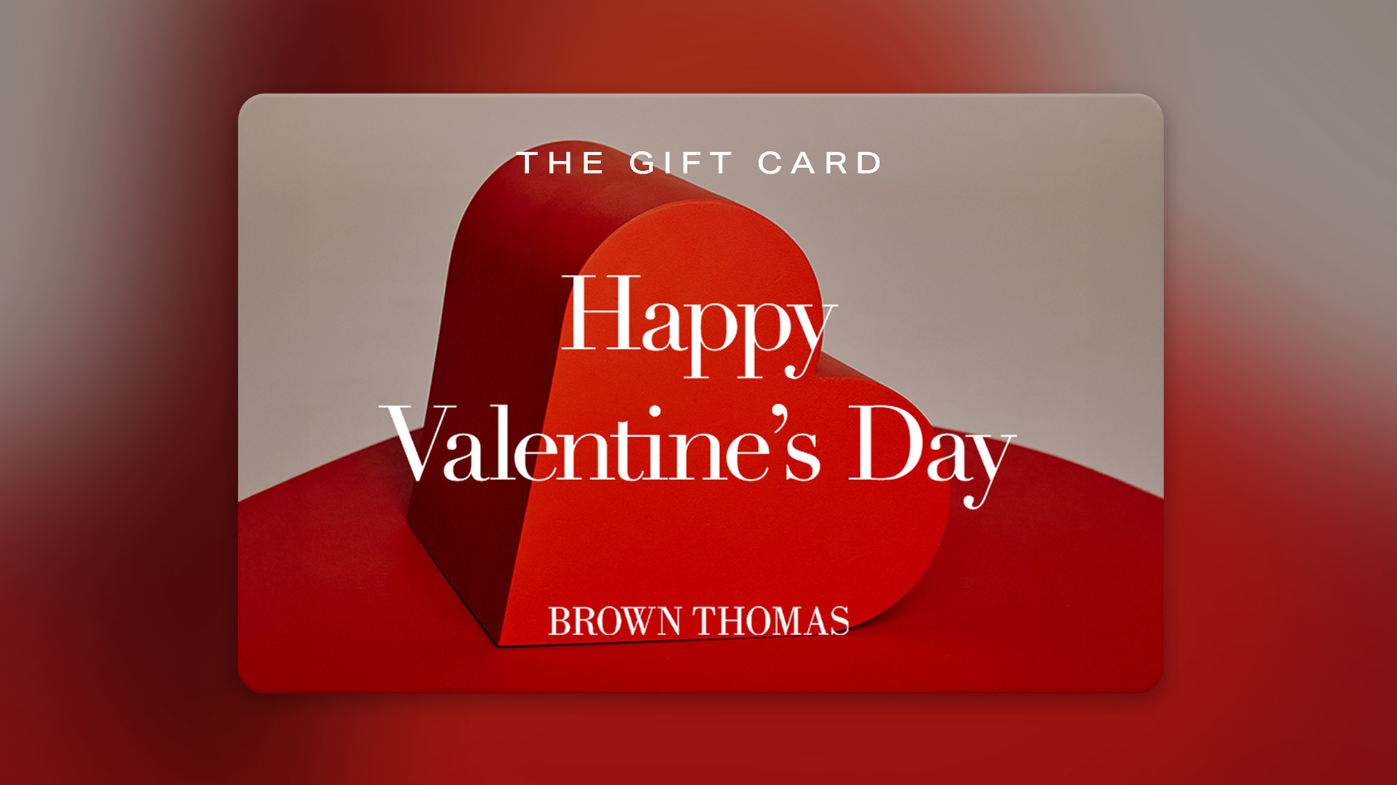 Red heart-shaped gift card with 'Happy Valentine's Day' and 'Brown Thomas' text.
