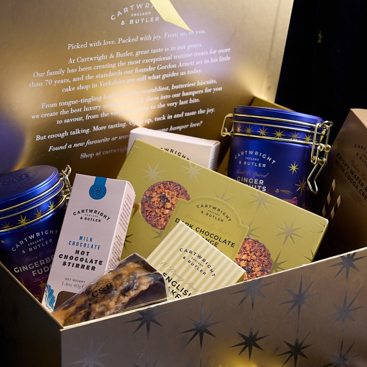 Luxury Cartwright & Butler advent calendars and hamper gift set with biscuits, chocolates, and ginger treats in festive packaging