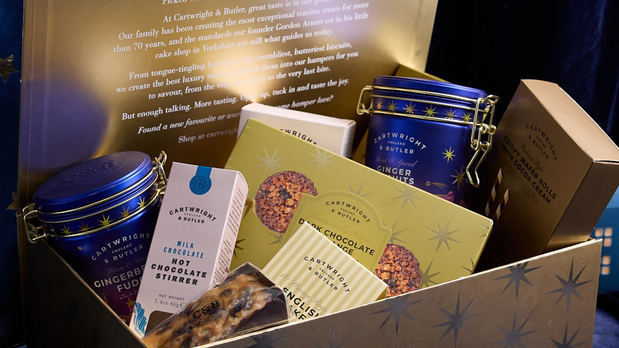 Luxury Cartwright & Butler advent calendars and hamper gift set with biscuits, chocolates, and ginger treats in festive packaging