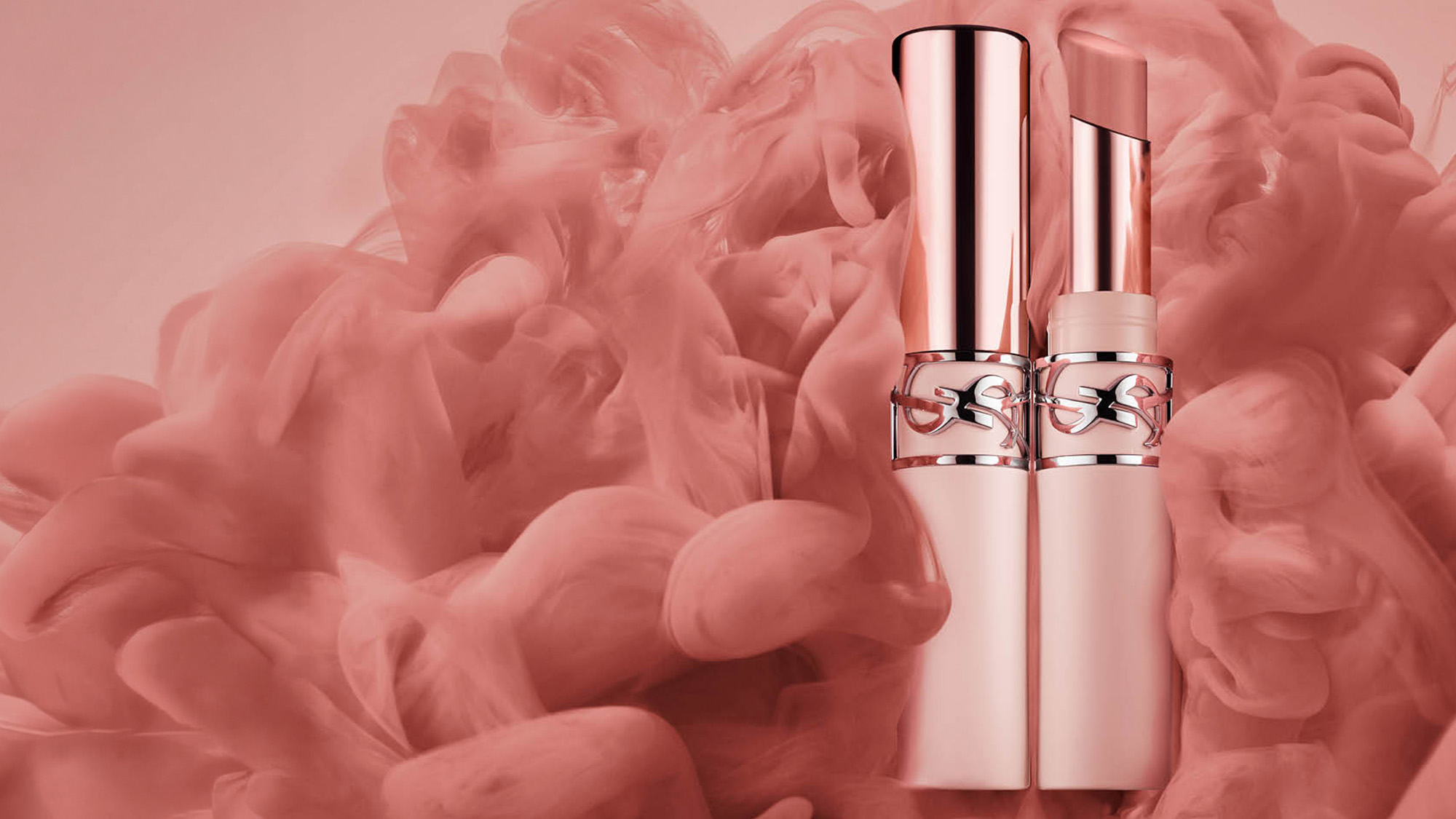 Lipstick and case surrounded by swirling pink smoke.