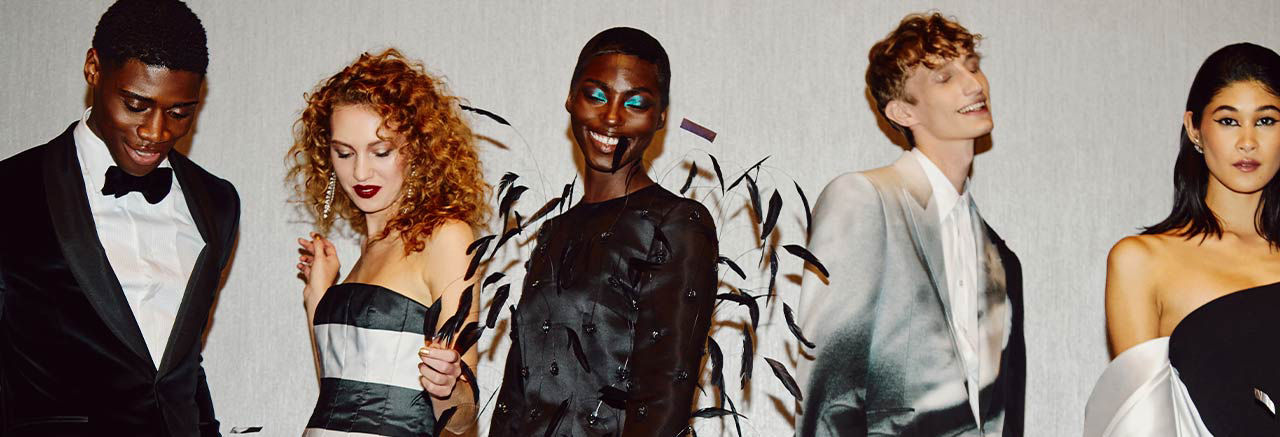 five models laughing and dancing