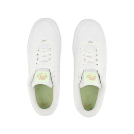 Nike Air Force 1 07 Trainers in white with pale green insoles and yellow branding detail, flat lay top-down view