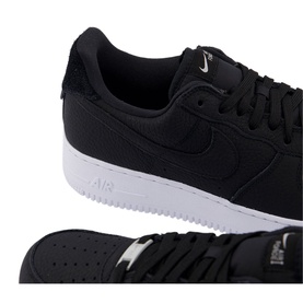 Nike Air Force 1 07 Trainers in black, low top with white chunky rubber sole, iconic Swoosh branding, lace fastening