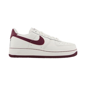 Nike Air Force 1 07 Trainers in white with burgundy swoosh branding, low-top silhouette, chunky rubber sole, and lace fastening