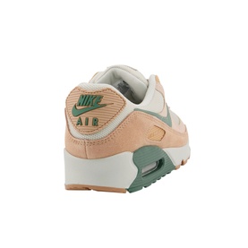 Nike Air Max 90 Trainers in beige with green suede heel panel, Air cushioning unit, and gum rubber sole