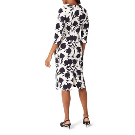 Model wearing Hobbs Aleena Floral Dress in cream with navy floral print, three-quarter sleeves and back vent, styled with black heels