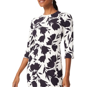 Model wearing Hobbs Aleena Floral Dress in cream with navy floral print, crew neck, and three-quarter length sleeves