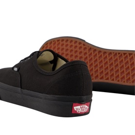 Vans Authentic Low Tops in black canvas with black sole, red Vans logo tab, and signature waffle outsole visible