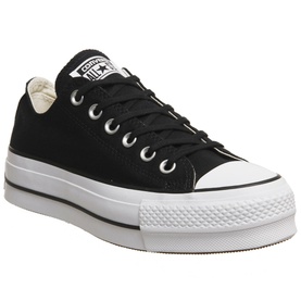 Converse All Star Platform Low Tops in black canvas with white platform sole and silver eyelets, low-cut silhouette