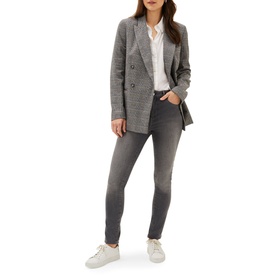 Model wearing Phase Eight Afie Check Blazer in grey with double-breasted fastening, styled with grey jeans and white trainers