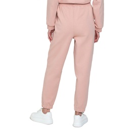 Model wearing Forever New Alexa High Waisted Jogger in pink, shown from behind, styled with matching pink sweatshirt and white trainers