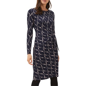 Model wearing Phase Eight Ally Print Dress in blue, long-sleeve knee-length fitted style with geometric print and tie waist detail