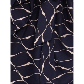Phase Eight Ally Print Dress in blue, close-up of navy fabric with cream abstract stem print and draped tie detail