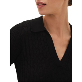 Model wearing Phase Eight Analise Pointelle Knit Dress in black, showing open collar neckline and ribbed knit detail at shoulder