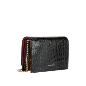 Alexander McQueen Skull Clutch Bag in black croc-embossed leather with gold chain strap and red contrast interior lining