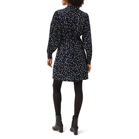 Model wearing Phase Eight Alexandra Ditsy Print Shirt Dress in blue with all-over print, tie belt, long sleeves