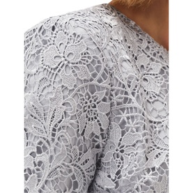 Model wearing Phase Eight Alisha Lace Jacket in green, featuring floral lace overlay, 3/4 fluted sleeves and edge-to-edge crop style