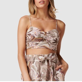 Model wearing Forever New Amena Crop Bustier Co-ord Top in pink floral print, styled with matching wide-leg trousers