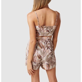 Model wearing Forever New Amena Crop Bustier Co-ord Top in pink floral print, styled with matching shorts, back view shown
