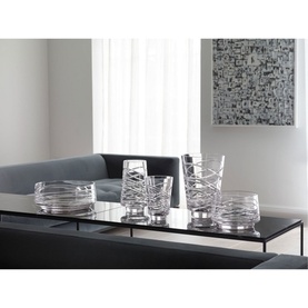 Waterford Aran Vase 30cm displayed with matching crystal collection on dark console table, featuring cut-glass wave pattern detailing