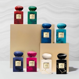 Armani Beauty Rouge Malachite Eau de Parfum displayed with full Priv&eacute; collection, featuring bottles in rich jewel tones with velvet caps