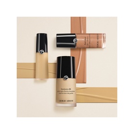 Armani Beauty Fluid Sheer Liquid Highlighter 18ml shown in three shades alongside gold-toned swatches on white background