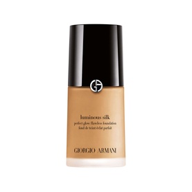 Armani Beauty Luminous Silk Foundation 30ml in a glass bottle with black cap, medium-tan shade visible through bottle
