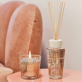BAOBAB My First Baobab Gift Box Paris gift set with lit rose gold glass candle and matching reed diffuser with white ceramic top.