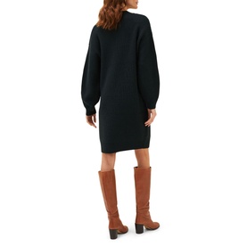 Model wearing Phase Eight Austina Chunky Stitch Knit Dress in green, balloon sleeves, round neck, knee length. Styled with tan knee-high boots