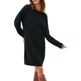 Model wearing Phase Eight Austina Chunky Stitch Knit Dress in green with balloon sleeves, round neck, and knee length, styled with tan boots