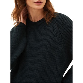 Model wearing Phase Eight Austina Chunky Stitch Knit Dress in green, featuring round neck, balloon sleeves, and chunky stitch detail