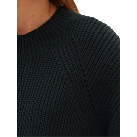 Model wearing Phase Eight Austina Chunky Stitch Knit Dress in green, featuring round neck and chunky ribbed knit texture