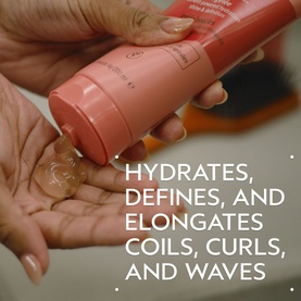 AVEDA Nutriplenish&trade; Curl Gelee 40ml being dispensed from coral pink tube into hand, with text highlighting curl-defining benefits